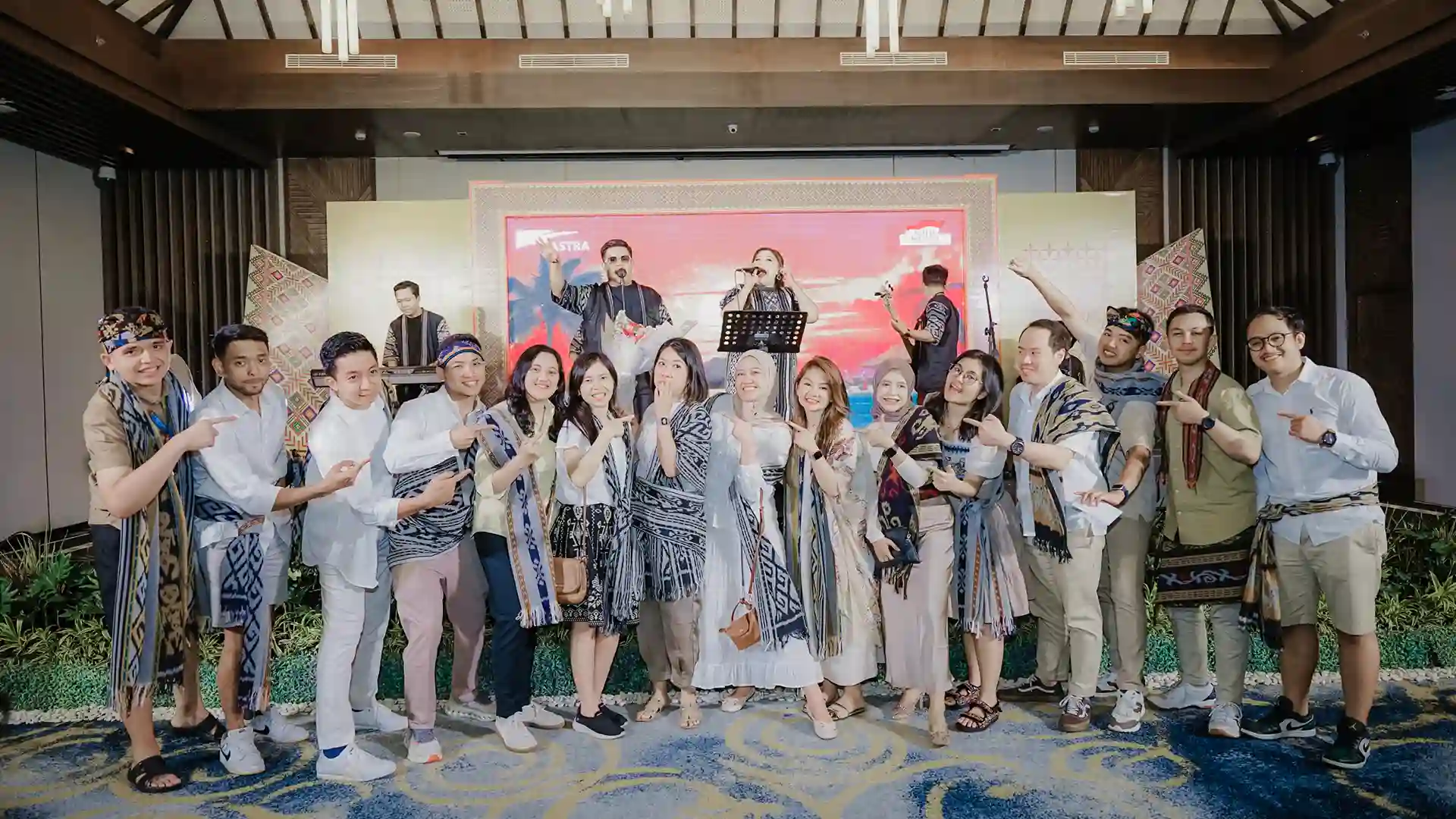 Attendees interacting with technology at a modern MICE event.